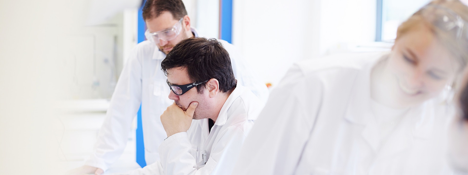 Man with hand on his chin overseeing governance excellence.